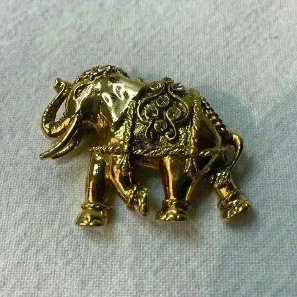 Vintage elephant, brooch, gold with bezel set rhinestones